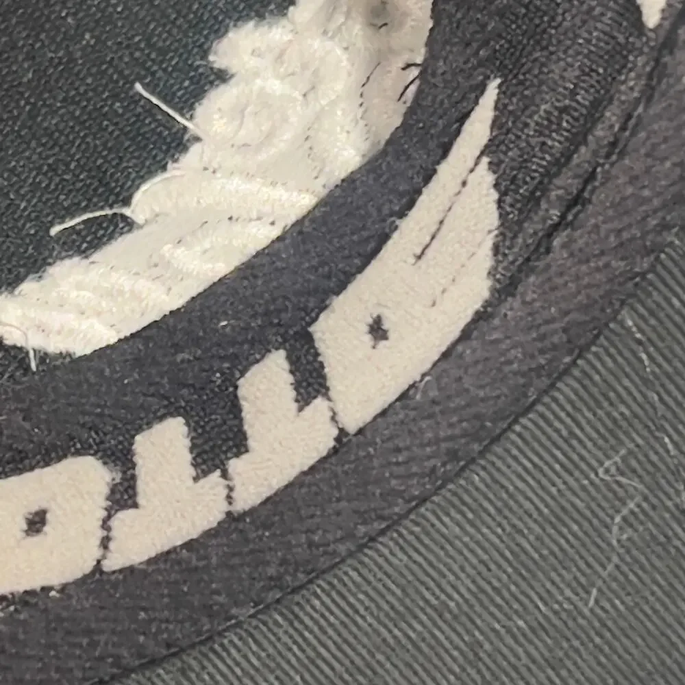 Hole in the Wall Black Flexible Fit L/XL Cap Embroidered White Logo OTTO Trucker